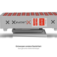 Liroma Compact Gen5 roodlichtlamp met ingeklapte standaard, plat neergelegd met het bedieningsscherm in beeld